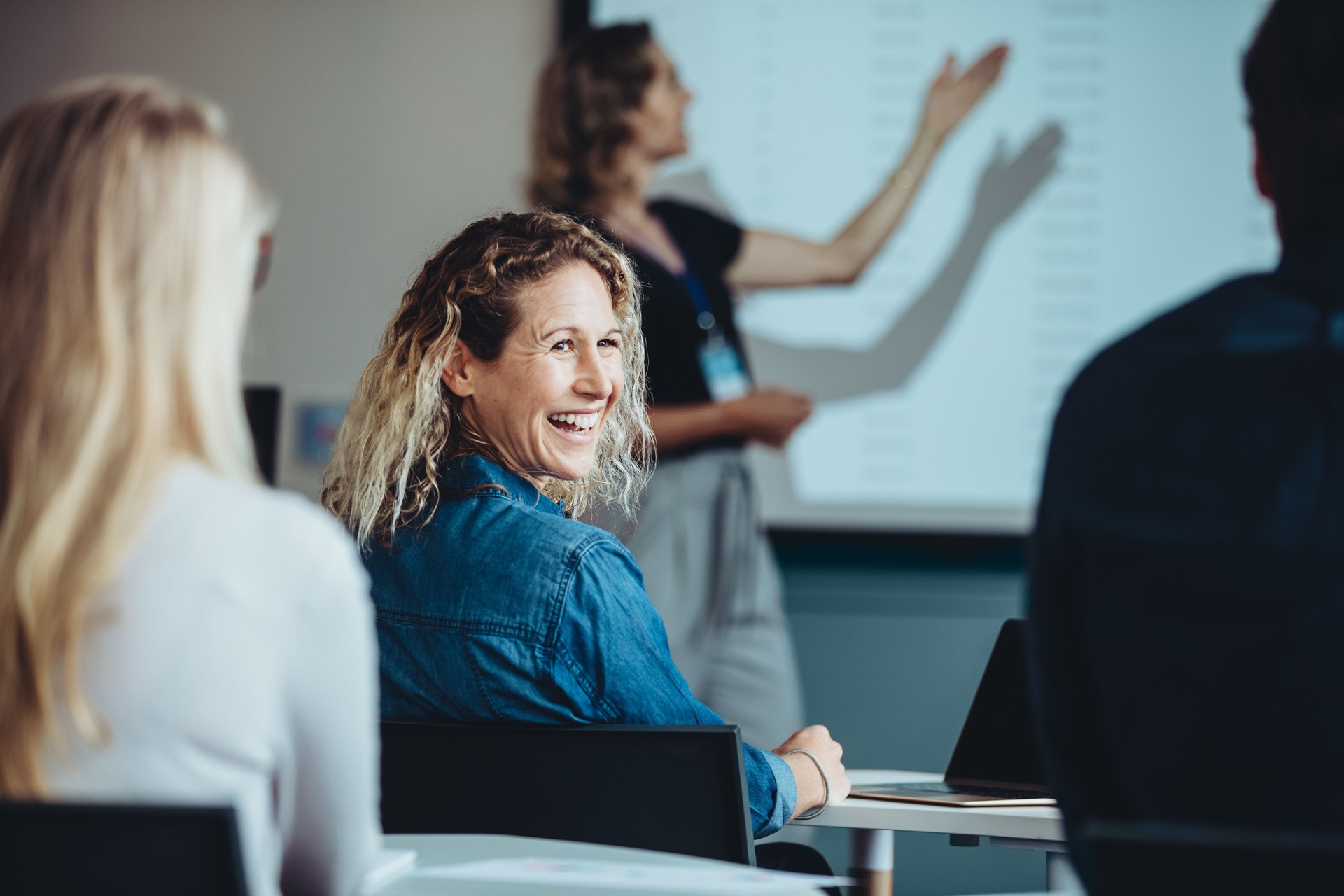 Businesswoman smiling during a presentation